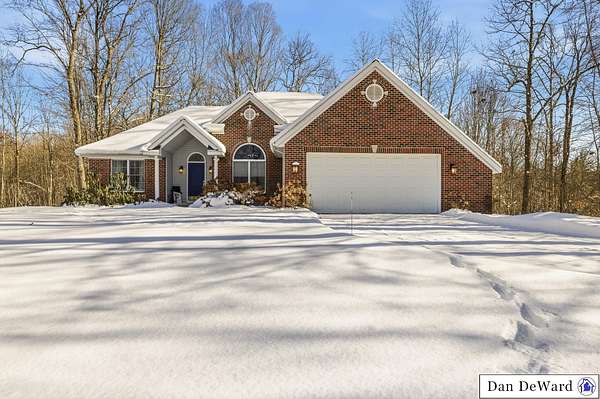 1.5 Acres of Residential Land with Home for Sale in Sparta, Michigan