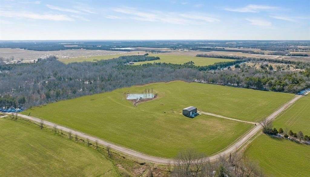 19.7 Acres of Recreational Land with Home for Sale in Roxton, Texas