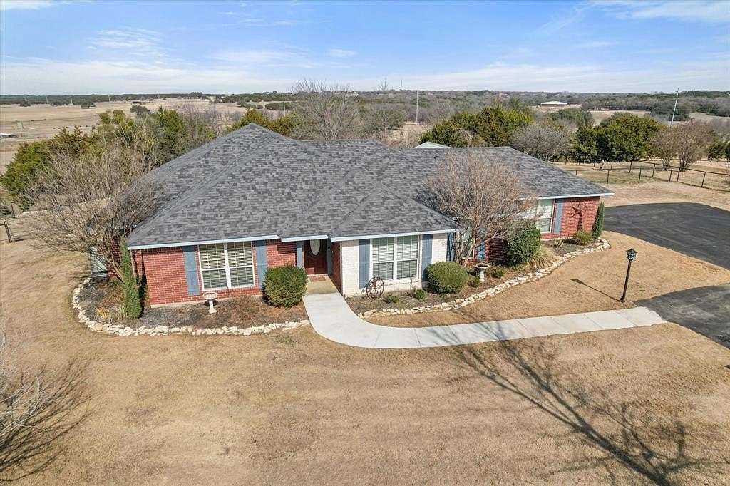 5.1 Acres of Land with Home for Sale in Granbury, Texas