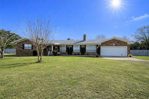 2.39 Acres of Land with Home for Sale in Pottsville, Arkansas