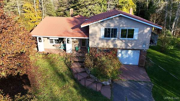 10.6 Acres of Land with Home for Sale in Eben Junction, Michigan