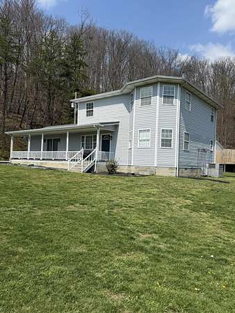 3 Acres of Land with Home for Sale in London, Kentucky