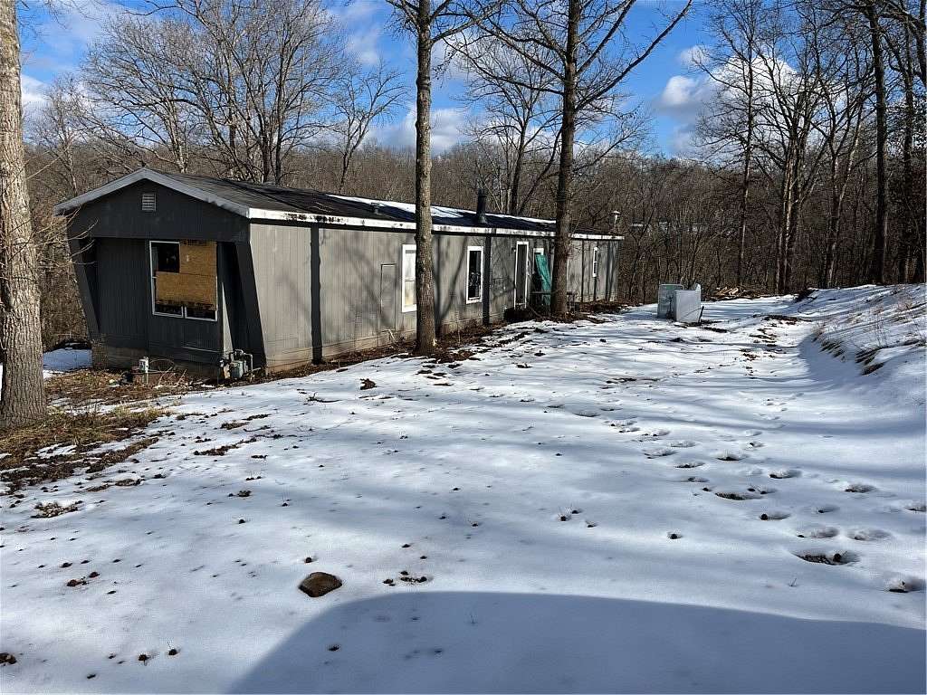 1.5 Acres of Land with Home for Sale in Rogers, Arkansas