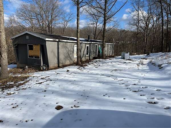 1.5 Acres of Land with Home for Sale in Rogers, Arkansas