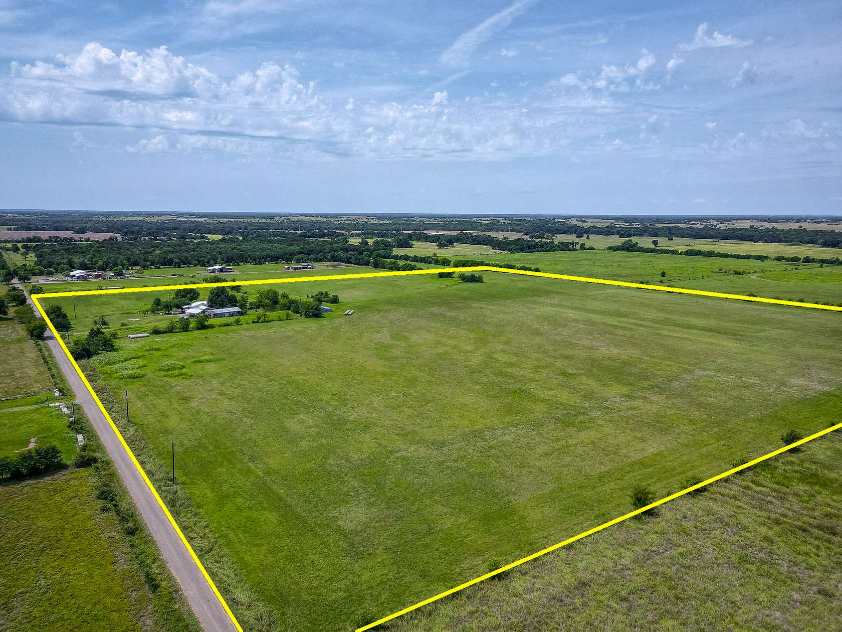 46.6 Acres of Agricultural Land with Home for Sale in Commerce, Texas