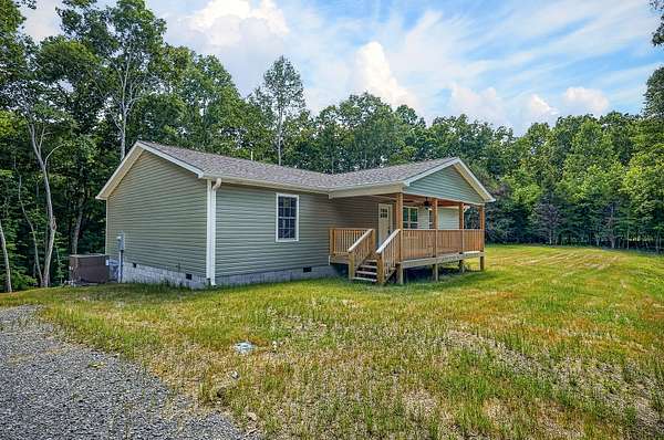 14.6 Acres of Land with Home for Sale in Hilham, Tennessee