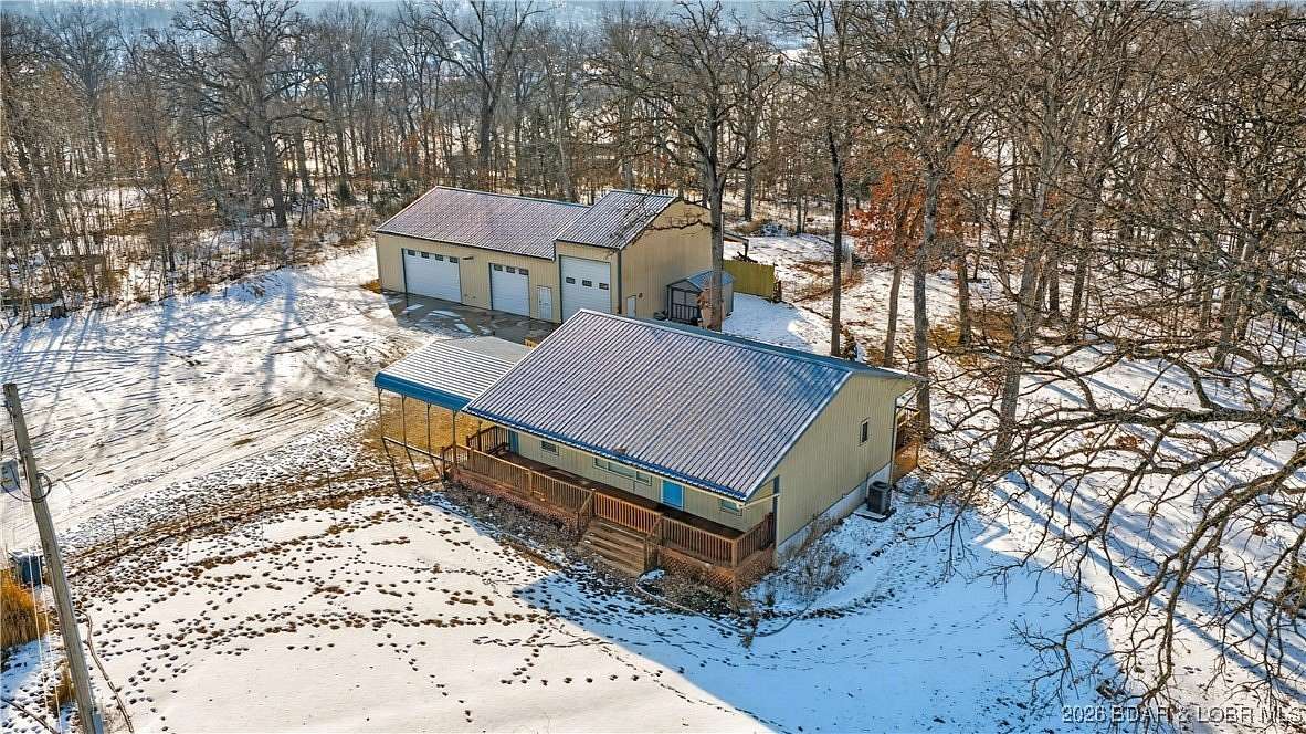 3.1 Acres of Land with Home for Sale in Gravois Mills, Missouri