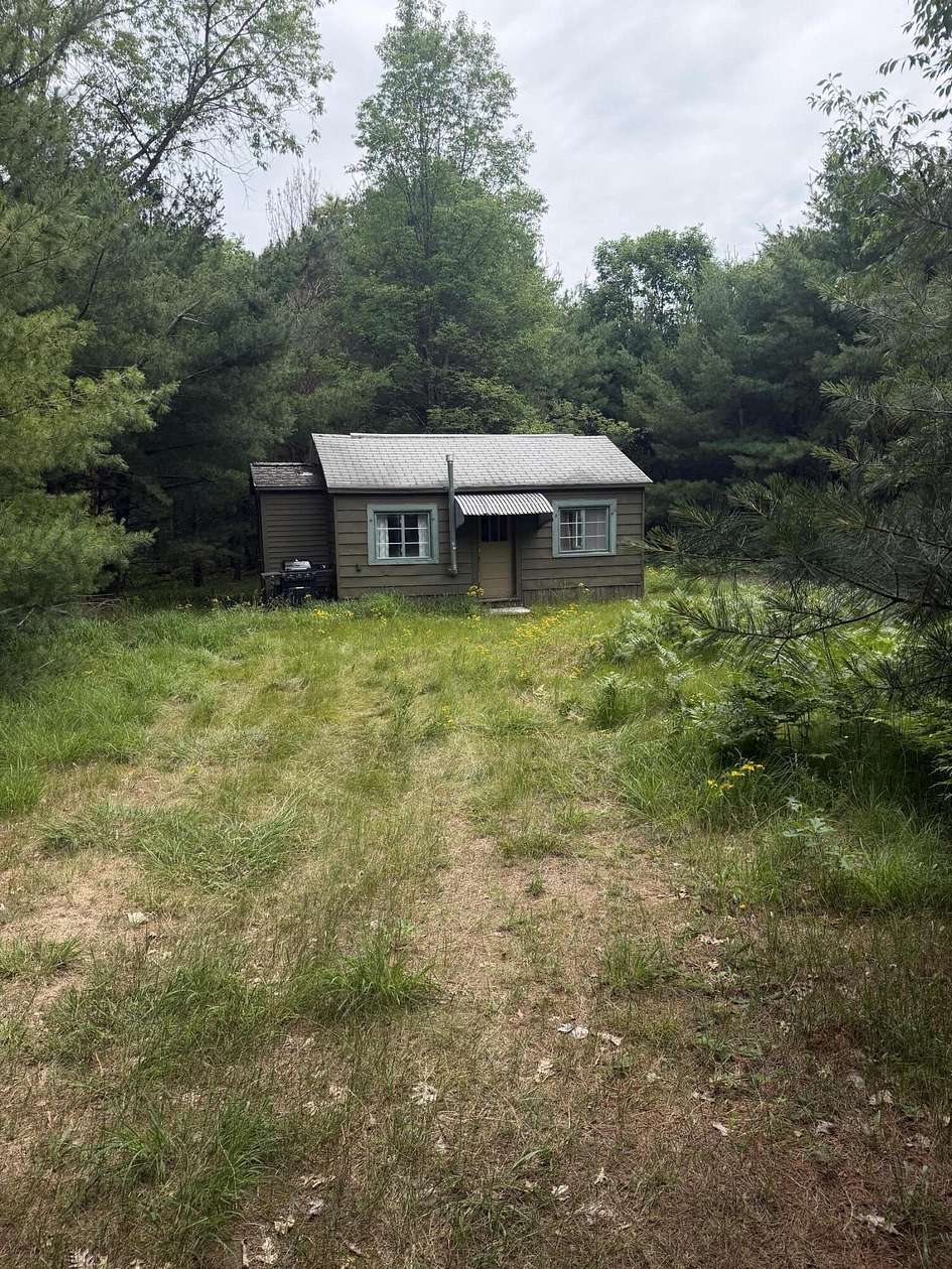 1 Acre of Land with Home for Sale in Luther, Michigan