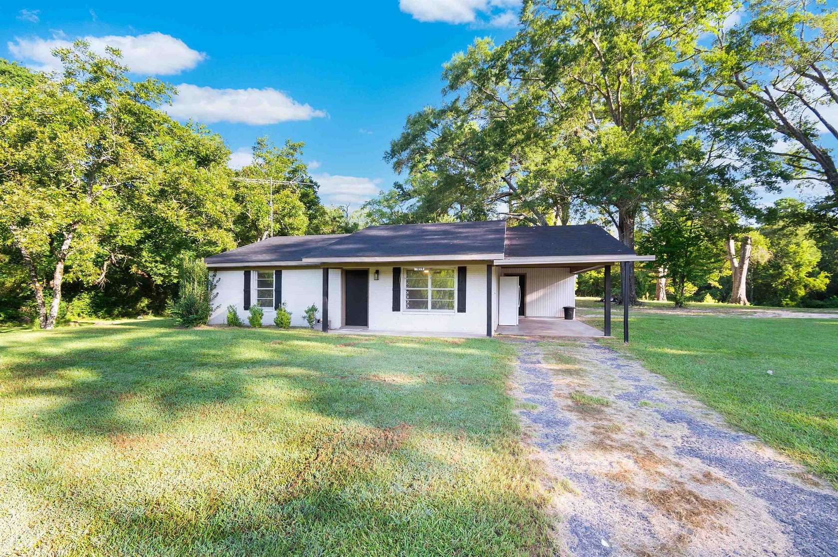 5.33 Acres of Residential Land with Home for Sale in Carthage, Texas