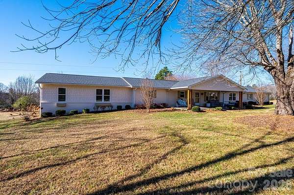 11.7 Acres of Land with Home for Sale in Hudson, North Carolina