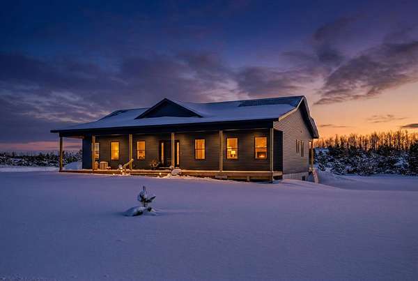 3 Acres of Land with Home for Sale in Elmira, Michigan