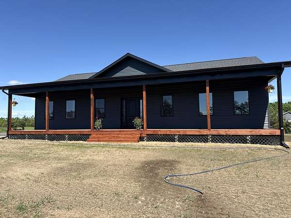 3 Acres of Land with Home for Sale in Elmira, Michigan