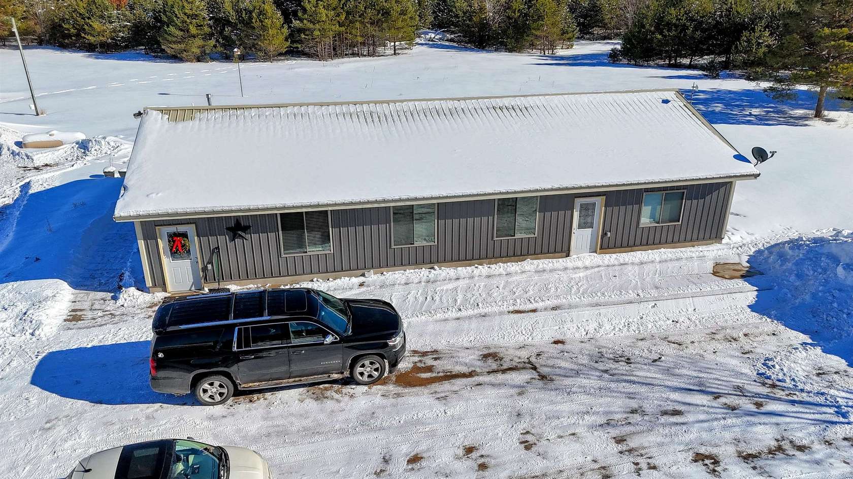 5 Acres of Land with Home for Sale in Fife Lake, Michigan