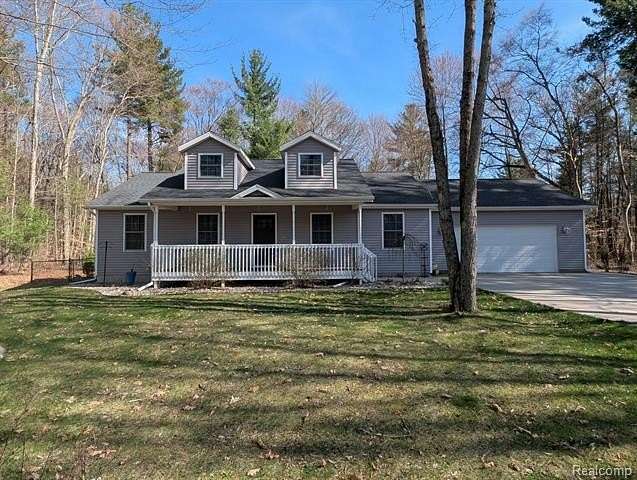 1.56 Acres of Land with Home for Sale in Reynolds Township, Michigan