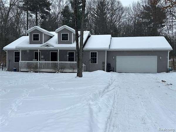 1.56 Acres of Land with Home for Sale in Reynolds Township, Michigan