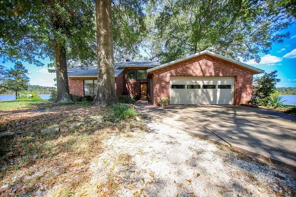 7 Acres of Residential Land with Home for Sale in Huntington, Texas