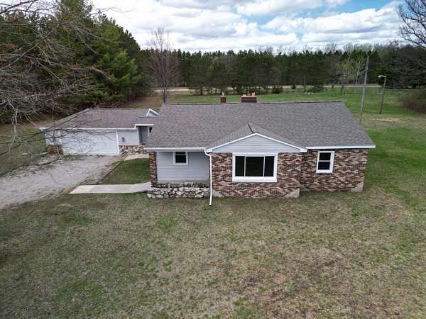 3 Acres of Land with Home for Sale in White Cloud, Michigan