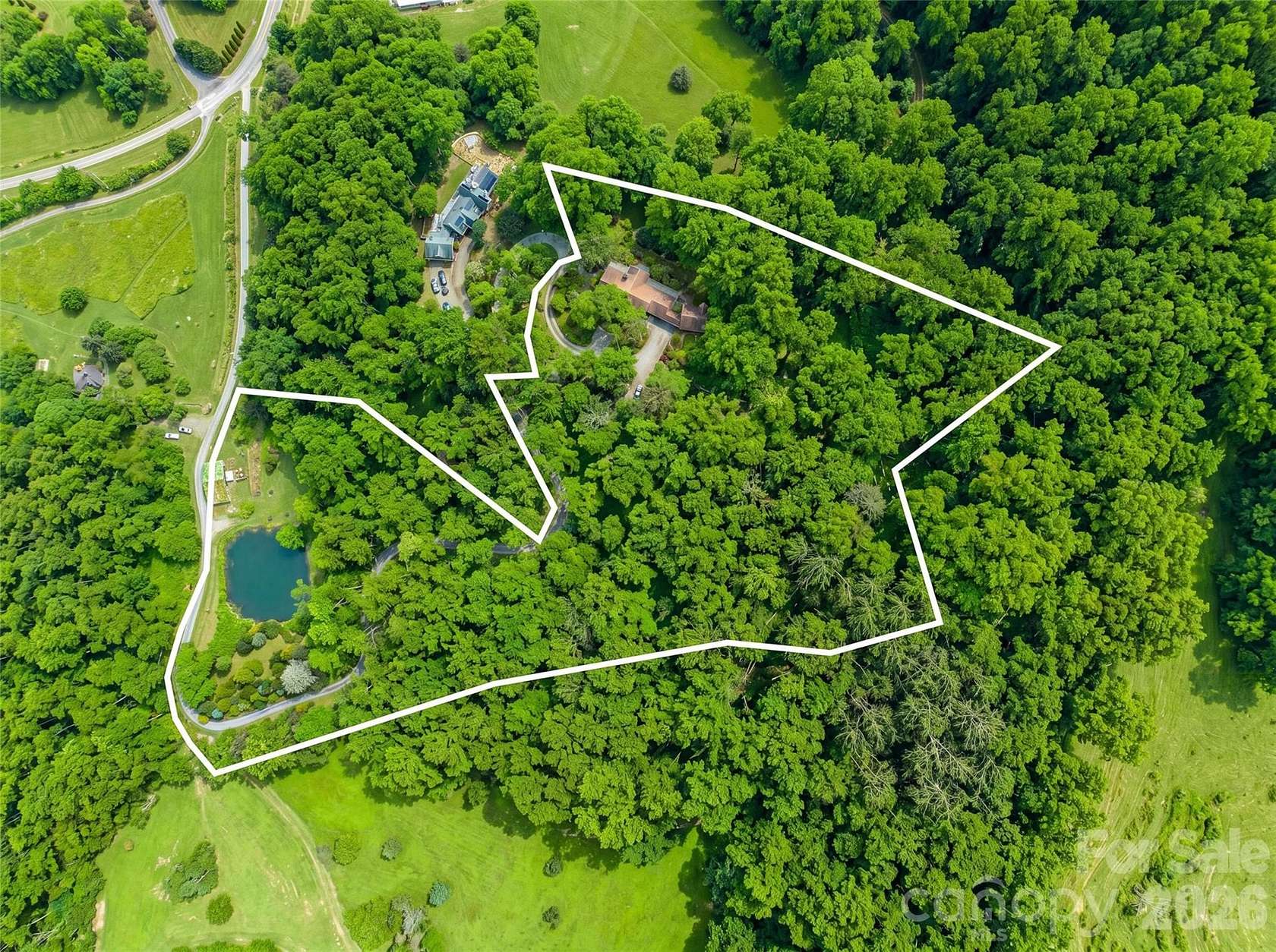 8.54 Acres of Land with Home for Sale in Leicester, North Carolina