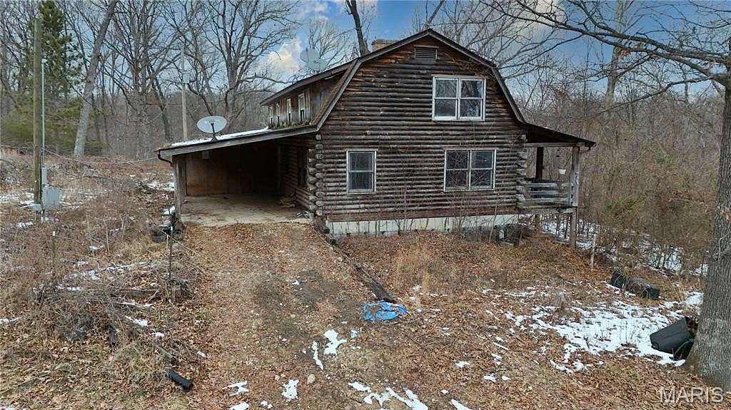 26.2 Acres of Land with Home for Sale in De Soto, Missouri