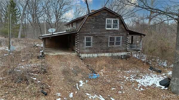 26.2 Acres of Land with Home for Sale in De Soto, Missouri