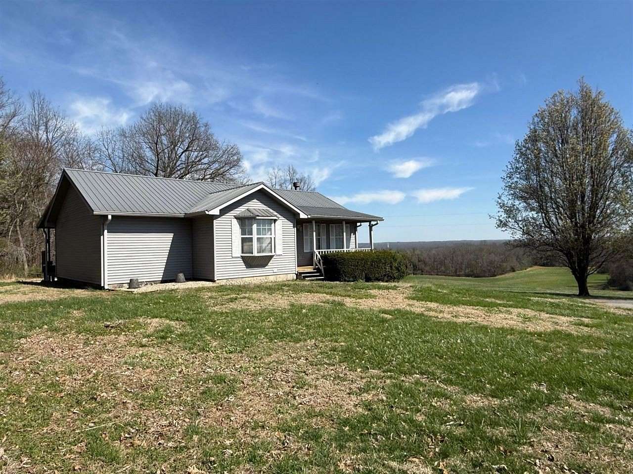 1.5 Acres of Land with Home for Sale in Canmer, Kentucky
