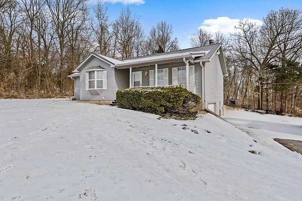 1.5 Acres of Residential Land with Home for Sale in Canmer, Kentucky