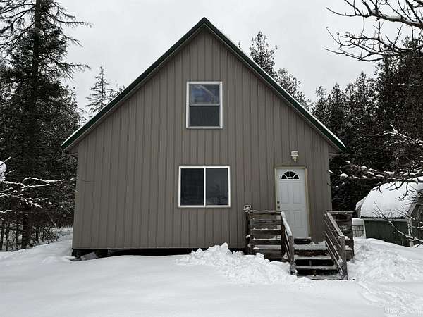 3 Acres of Residential Land with Home for Sale in Perronville, Michigan