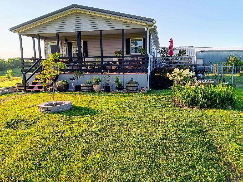 9.54 Acres of Land with Home for Sale in Rayville, Missouri