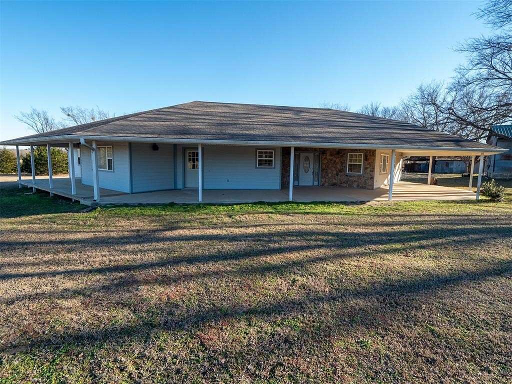 10 Acres of Residential Land with Home for Sale in Prague, Oklahoma