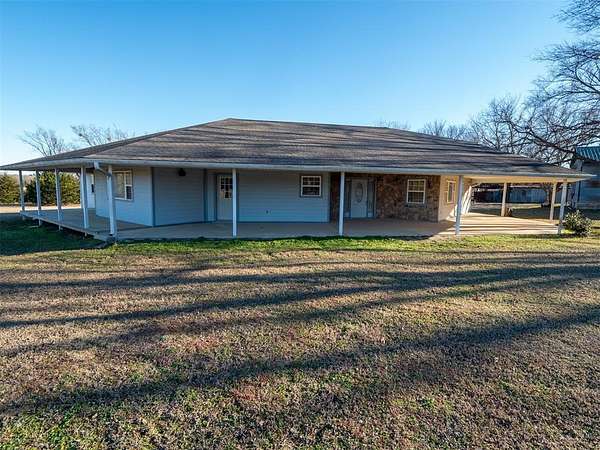 10 Acres of Residential Land with Home for Sale in Prague, Oklahoma