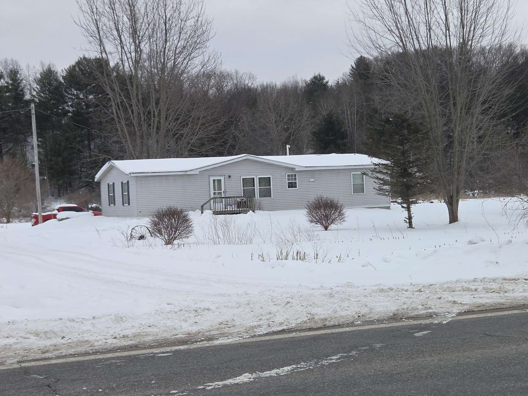 121 Acres of Land with Home for Sale in Twin Lake, Michigan