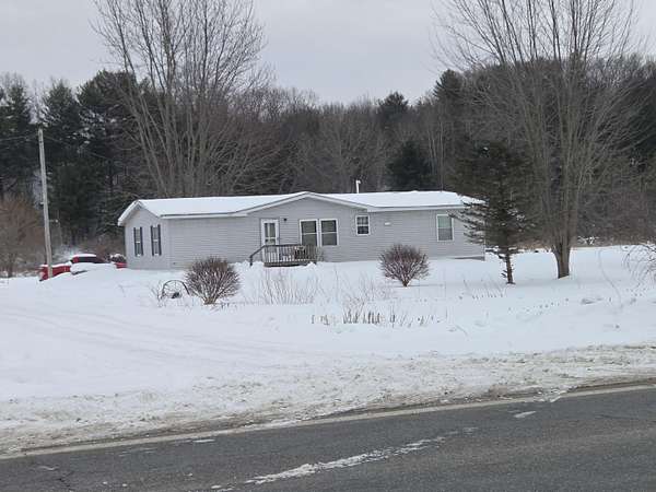 121 Acres of Land with Home for Sale in Twin Lake, Michigan