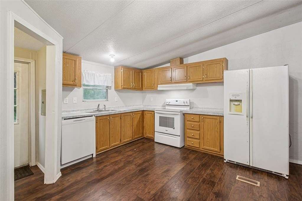 5 Acres of Residential Land with Home for Sale in Moore, Oklahoma