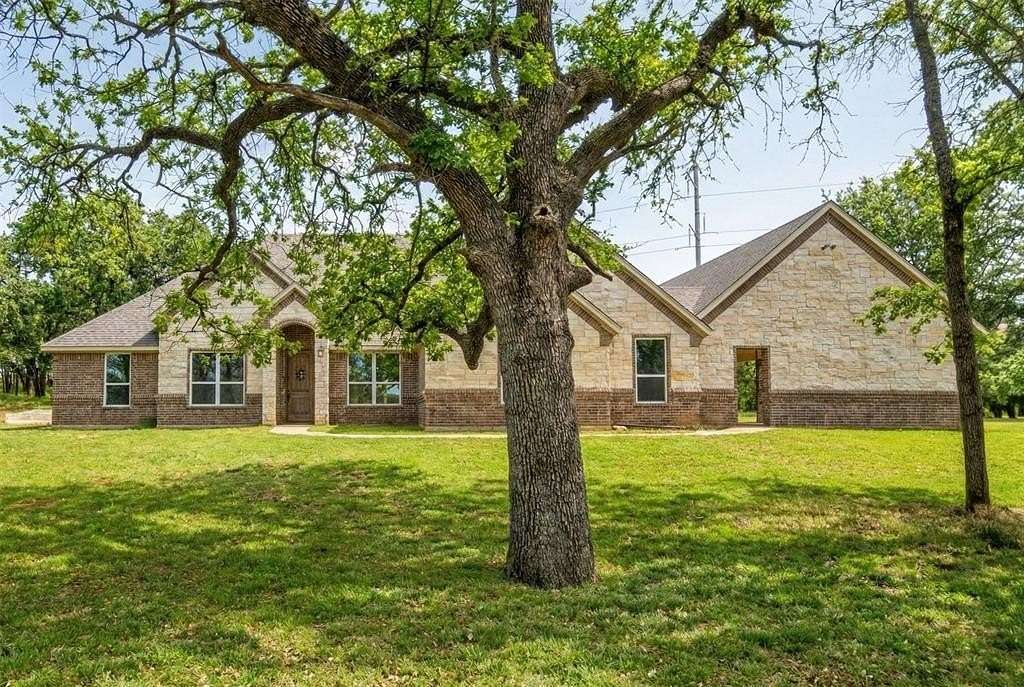 5 Acres of Residential Land with Home for Sale in Springtown, Texas