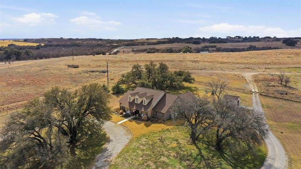 56.9 Acres of Agricultural Land with Home for Sale in Comanche, Texas