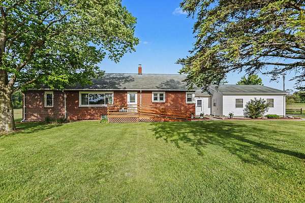34.1 Acres of Agricultural Land with Home for Sale in Eau Claire, Michigan