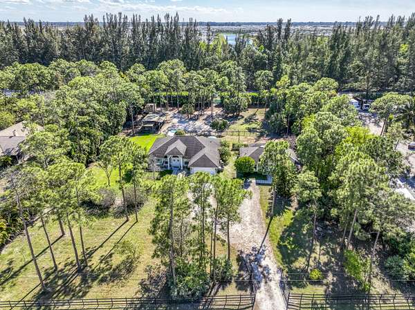 2.1 Acres of Residential Land with Home for Sale in Loxahatchee Groves, Florida