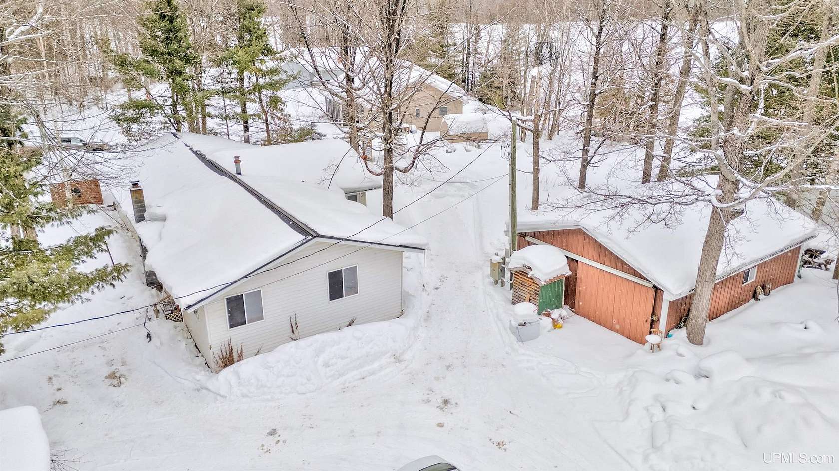 2.5 Acres of Residential Land with Home for Sale in Wetmore, Michigan