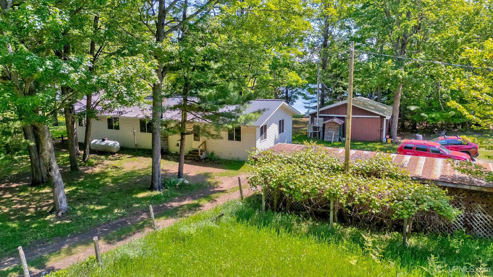 2.5 Acres of Land with Home for Sale in Wetmore, Michigan