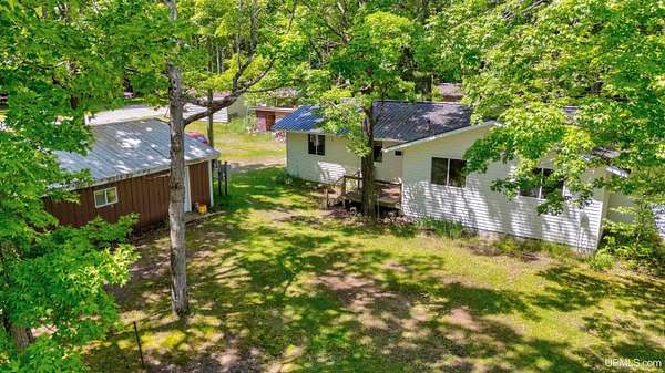2.5 Acres of Land with Home for Sale in Wetmore, Michigan