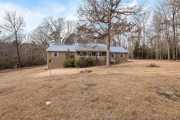 14.6 Acres of Land with Home for Sale in Sanford, North Carolina