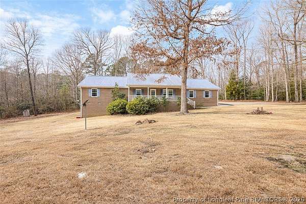 14.6 Acres of Land with Home for Sale in Sanford, North Carolina