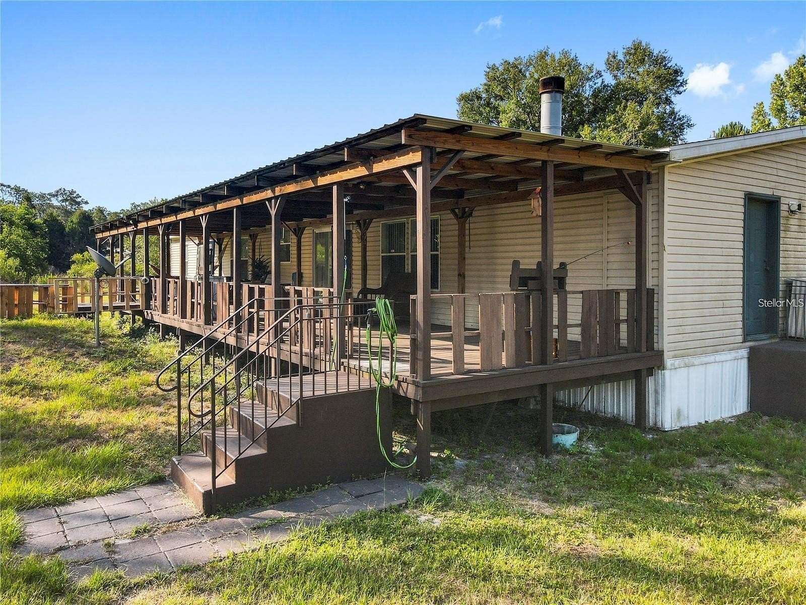 10.5 Acres of Land with Home for Sale in Kathleen, Florida