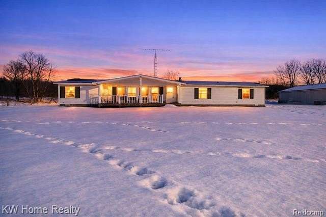 14 Acres of Land with Home for Sale in Columbiaville, Michigan