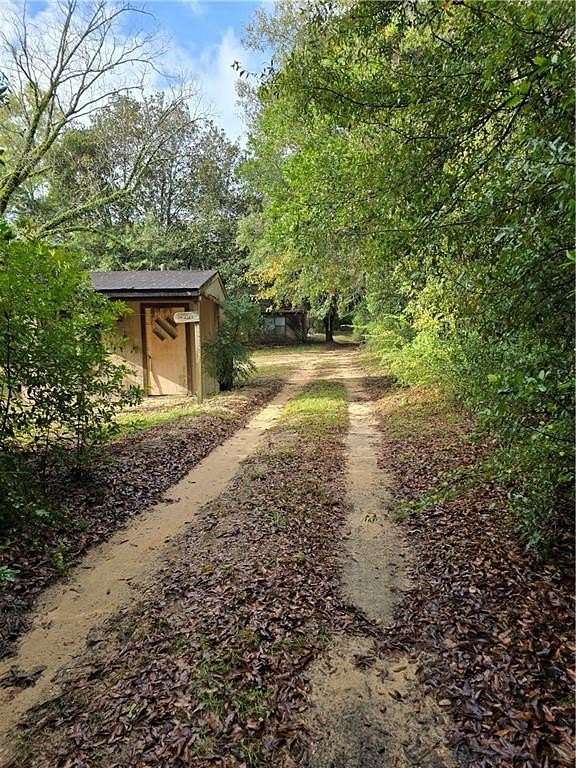 5.4 Acres of Residential Land with Home for Sale in Eight Mile, Alabama