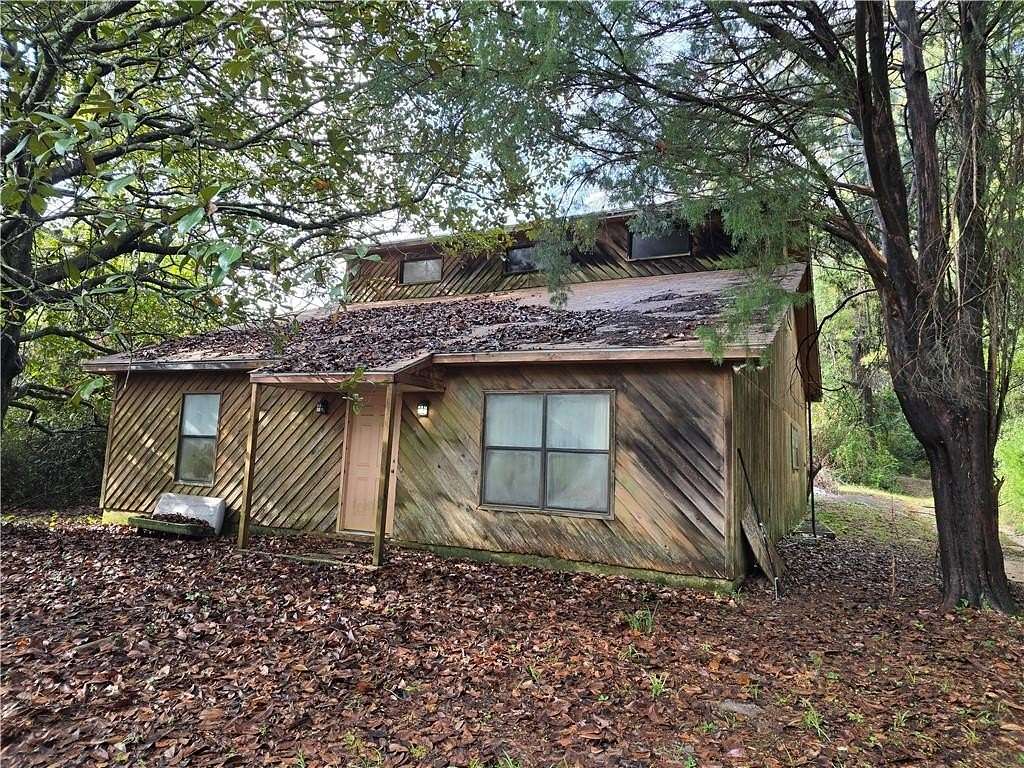 5.4 Acres of Land with Home for Sale in Eight Mile, Alabama