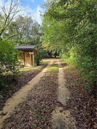 5.4 Acres of Residential Land with Home for Sale in Eight Mile, Alabama
