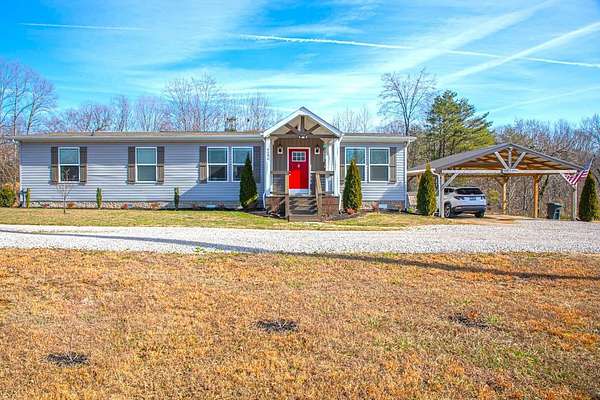 33.9 Acres of Land with Home for Sale in Liberty, Kentucky