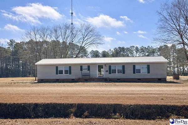 3 Acres of Residential Land with Home for Sale in Coward, South Carolina