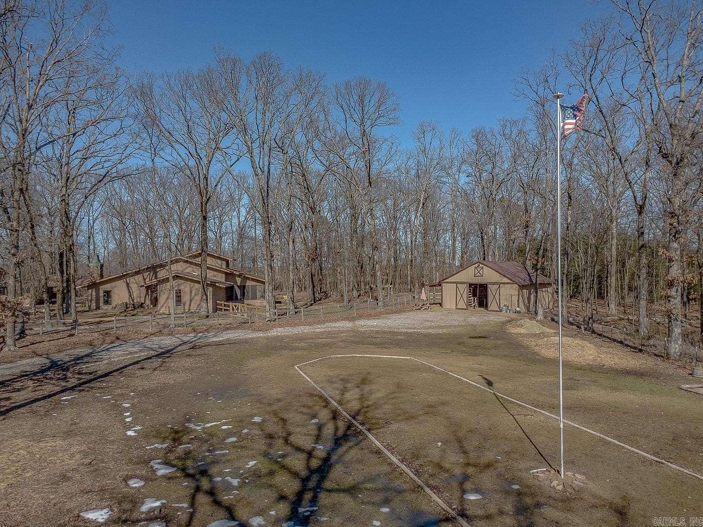 8.74 Acres of Land with Home for Sale in Fisher, Arkansas